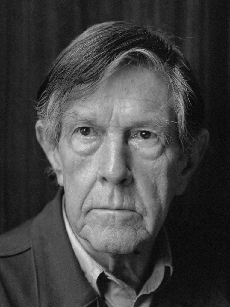 Monotone up close photo of face of older man.